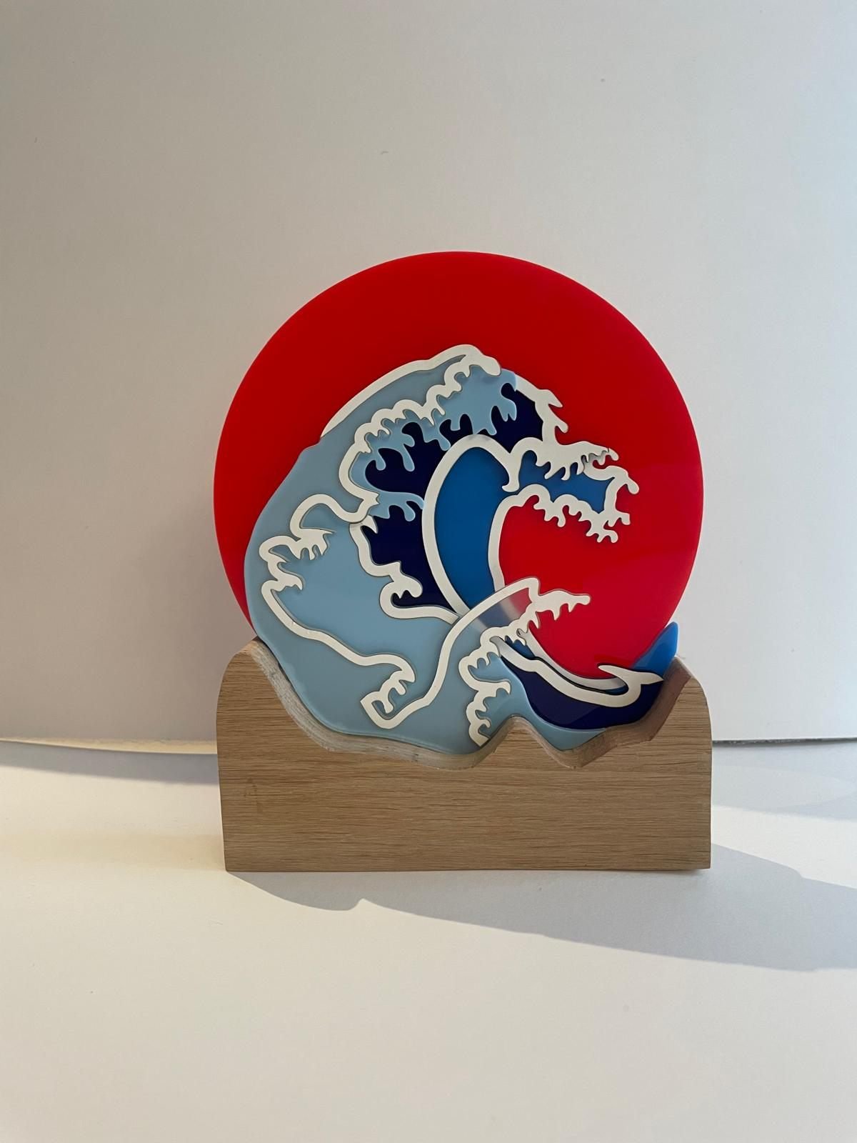 Japanese wave award in layered acrylic on a solid oak base