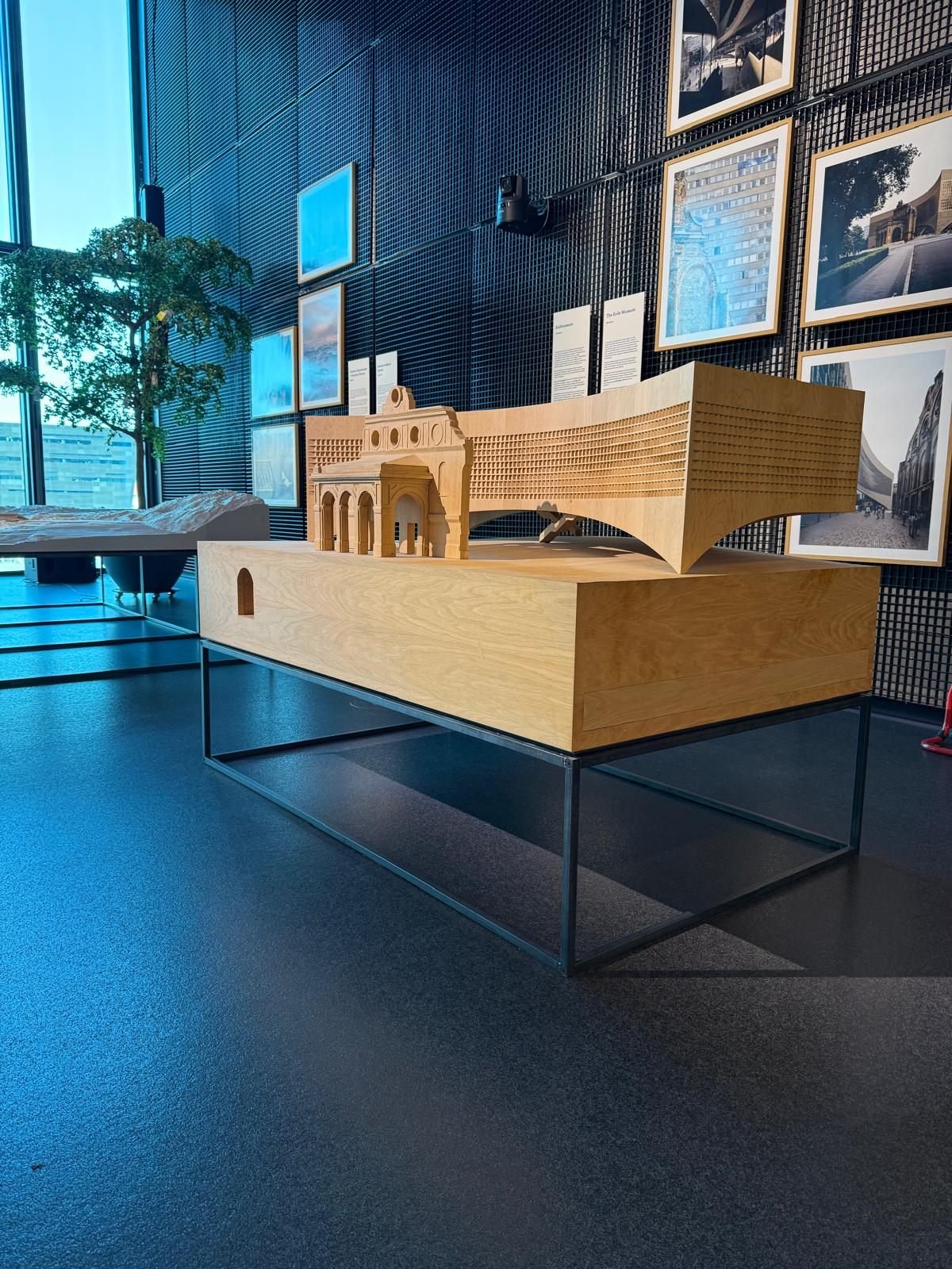 Solid oak model of the Exile Museum on its exhibition table