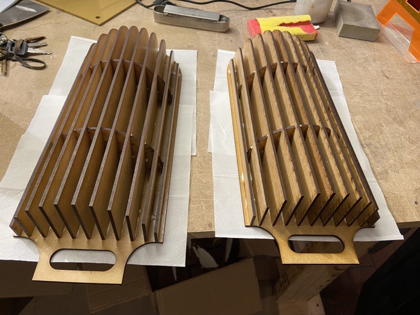 Laser-cut parts on the workshop bench