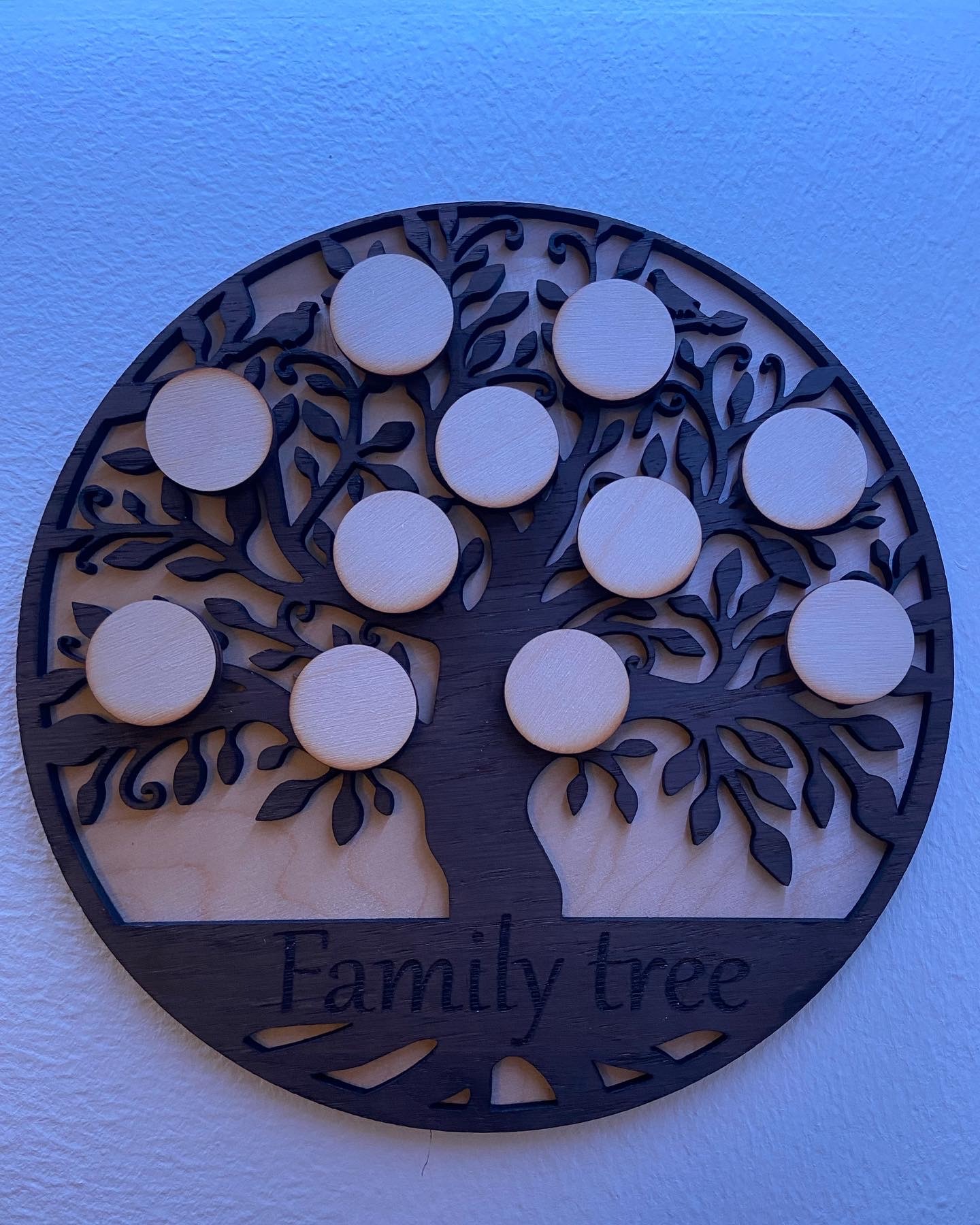 Layered laser cut family tree wall piece